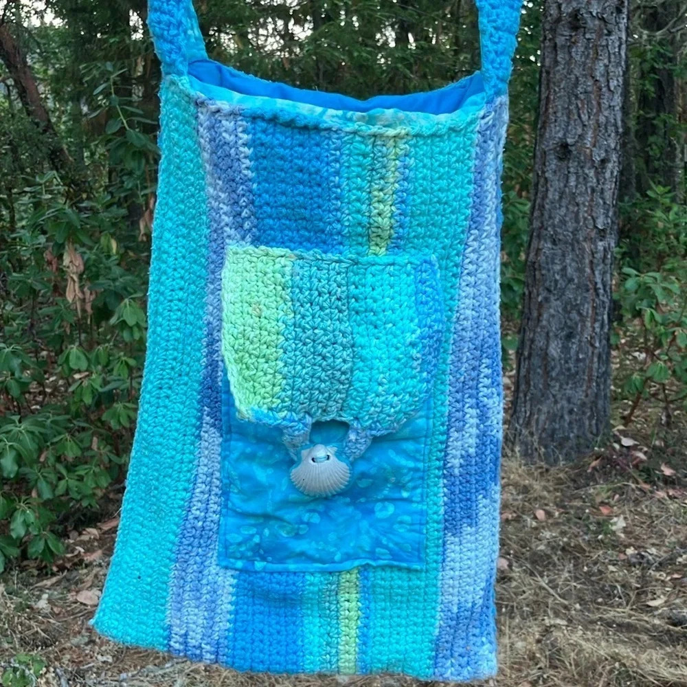 Handmade crochet bag with shell pocket and batik beautiful colors